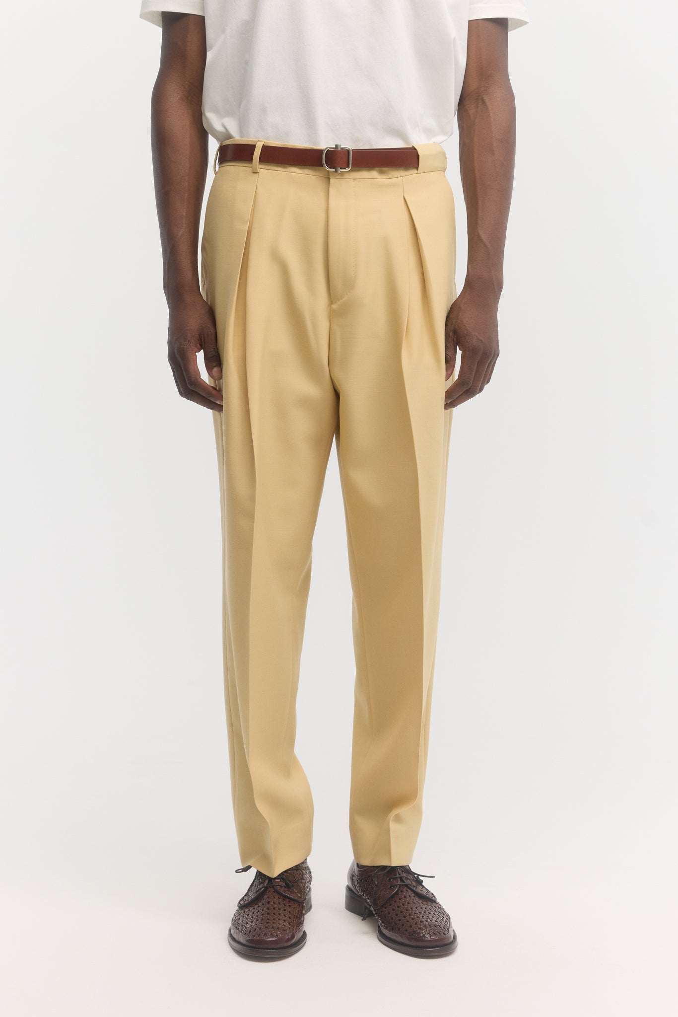 Pantalon parachute en laine vierge jaune beurre