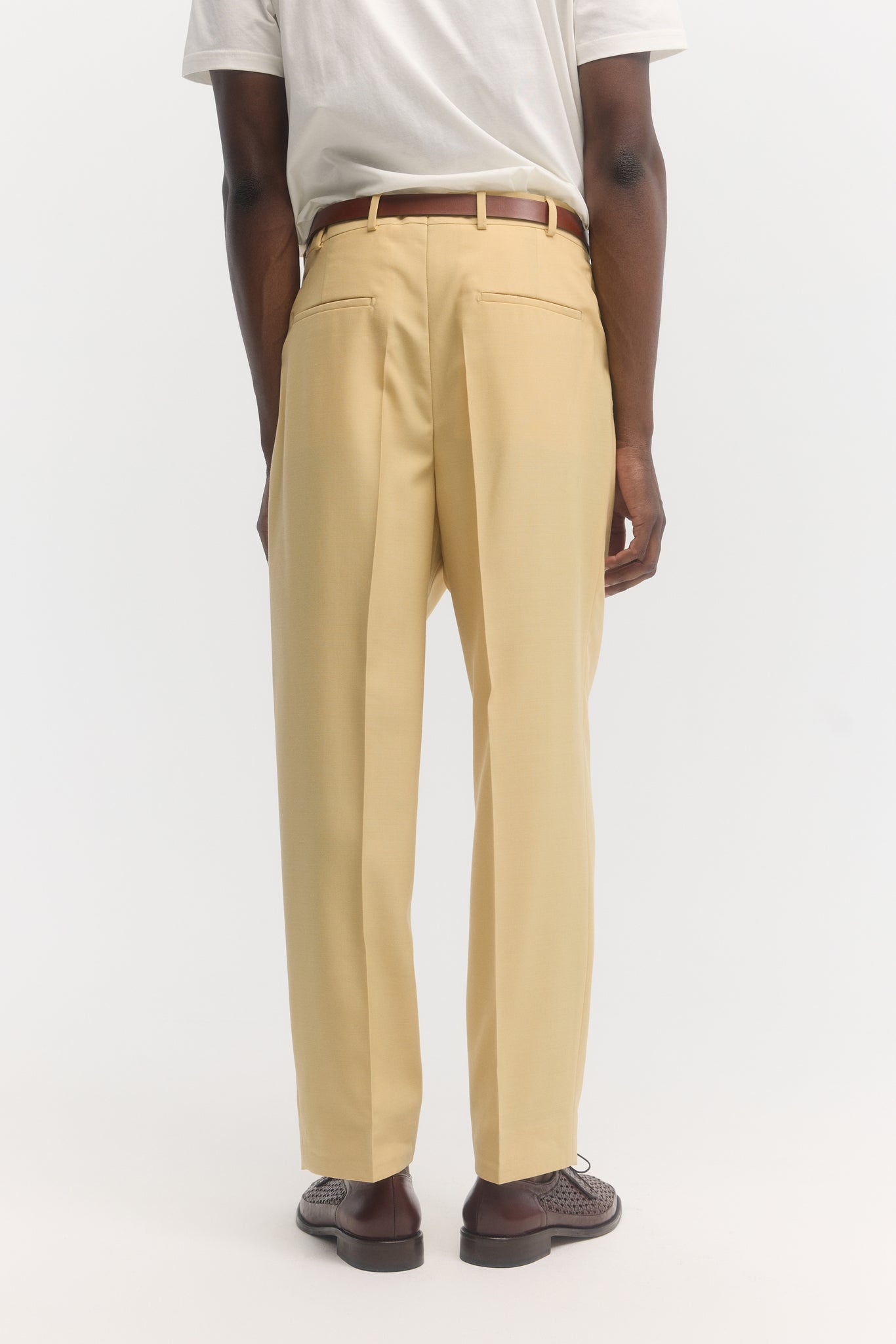 Pantalon parachute en laine vierge jaune beurre