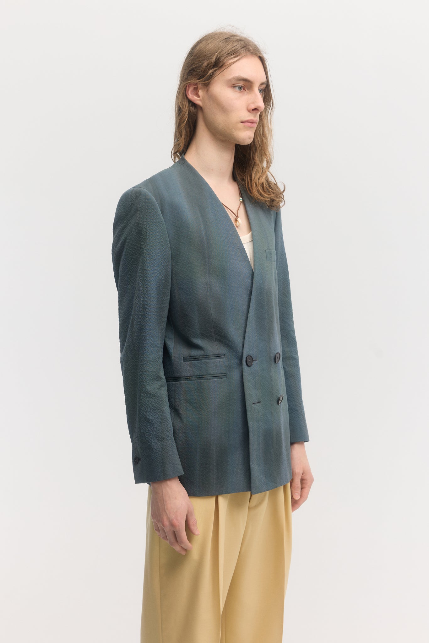 Iridescent custom dyed cotton seersucker double breasted collarless jacket