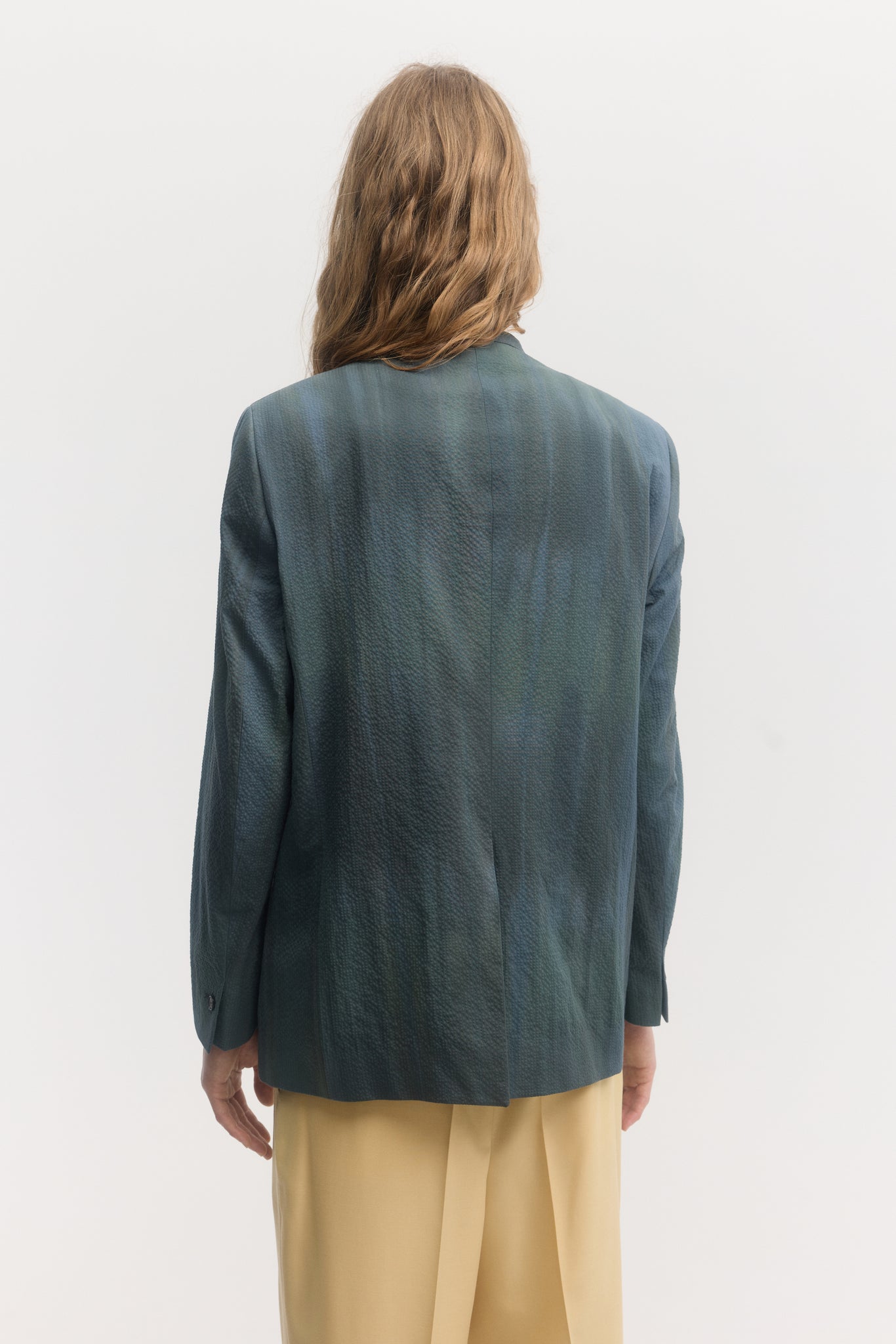 Iridescent custom dyed cotton seersucker double breasted collarless jacket