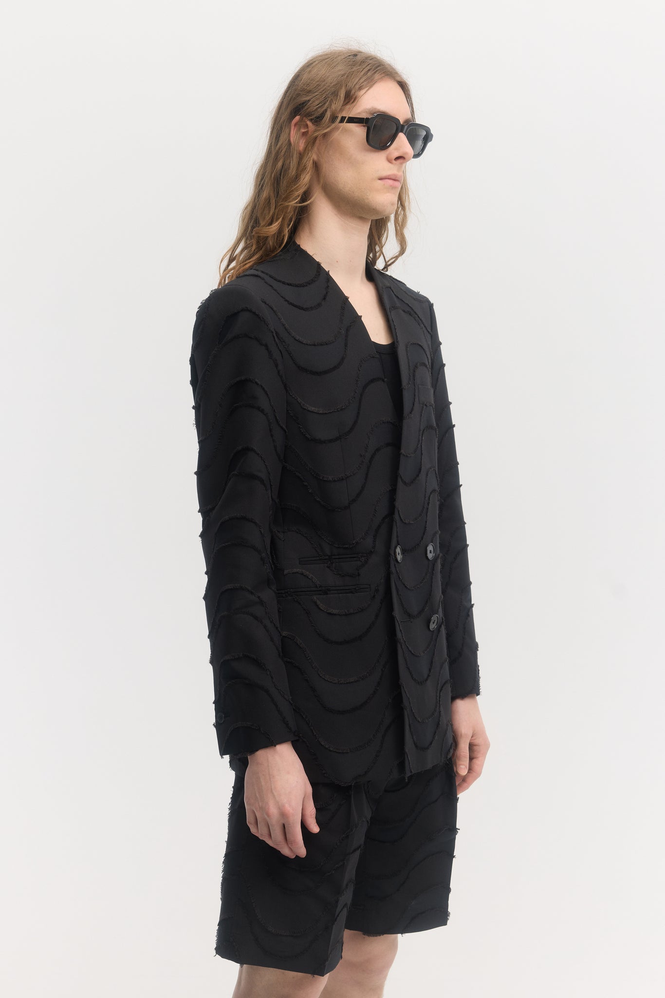 Black wave cut jacquard double breasted collarless jacket