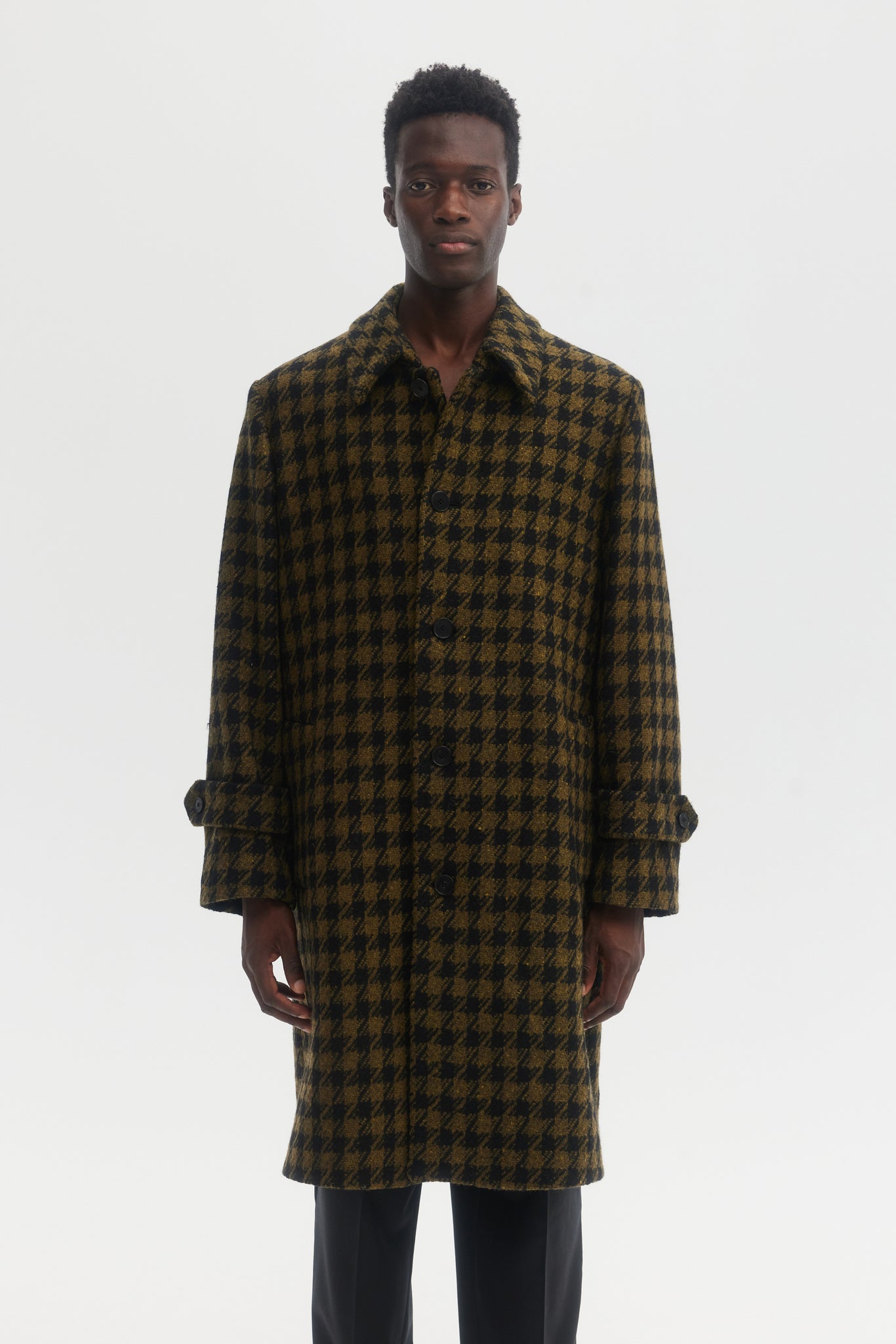 Black and green dogtooth wool overcoat