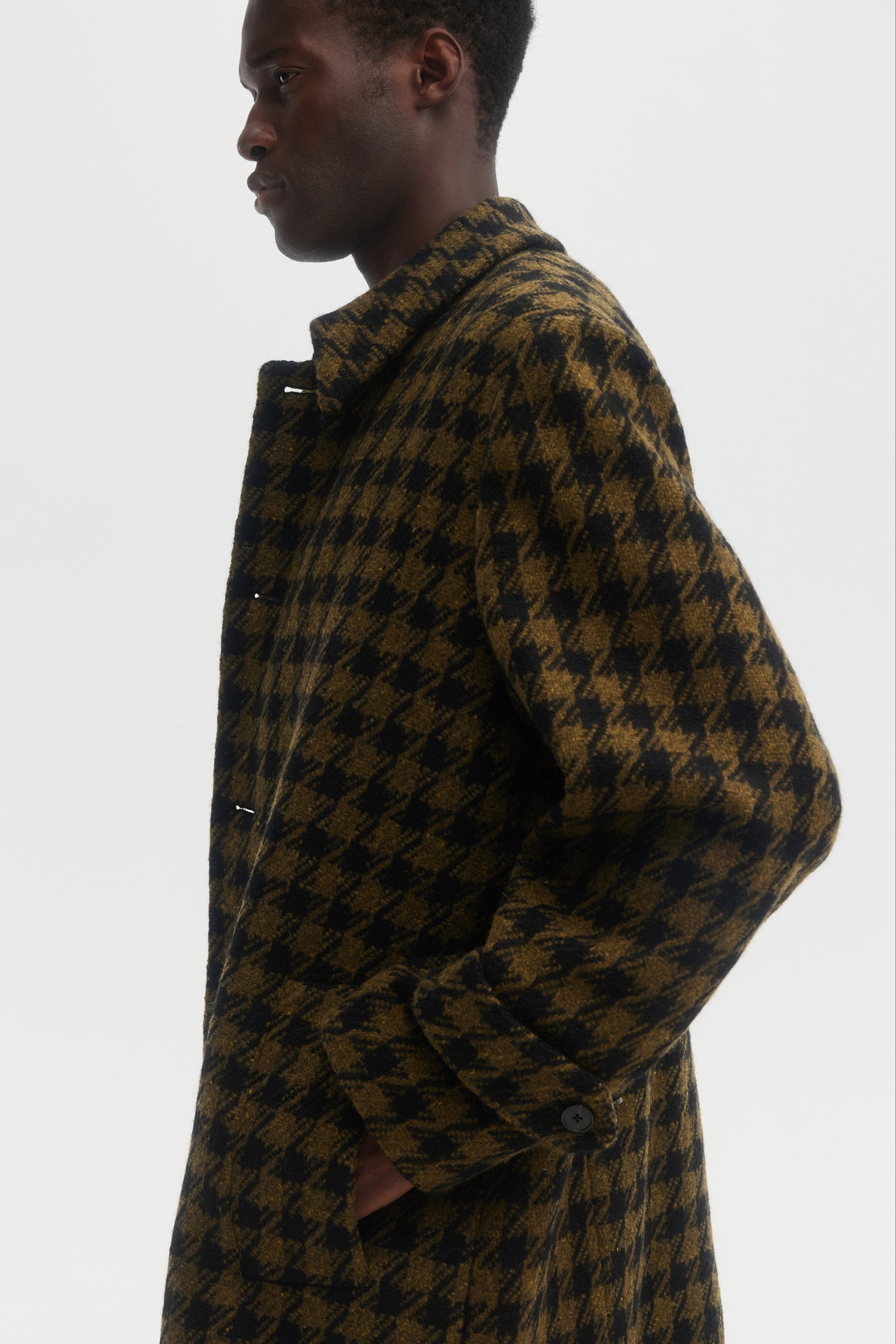 Black and green dogtooth wool overcoat